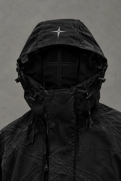 Hood up, with the reflective cross on the crown